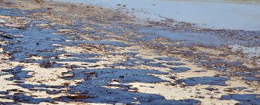 oil spills in waters affect environment and communities