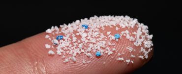 Microplastics on finger