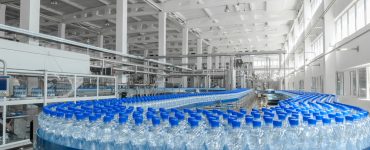 Plastic water bottles in production plant