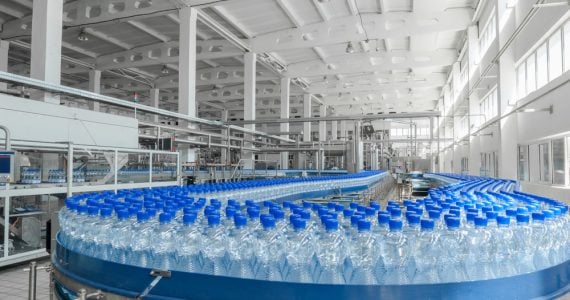 Plastic water bottles in production plant