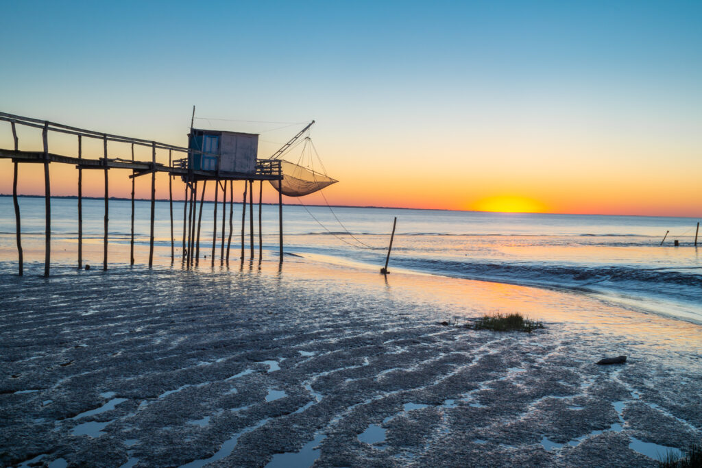 a beach at low tide with no water