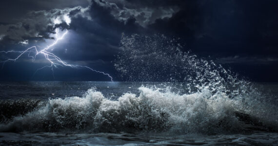 a huge wave in the coean during a storm