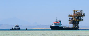 deep sea mining ships and a rig