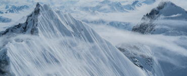 a view of a moutnain covered in snow