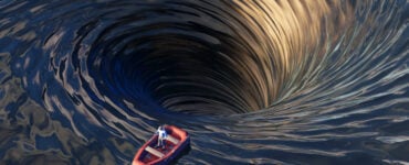 a boat being sucked into a whirlpool