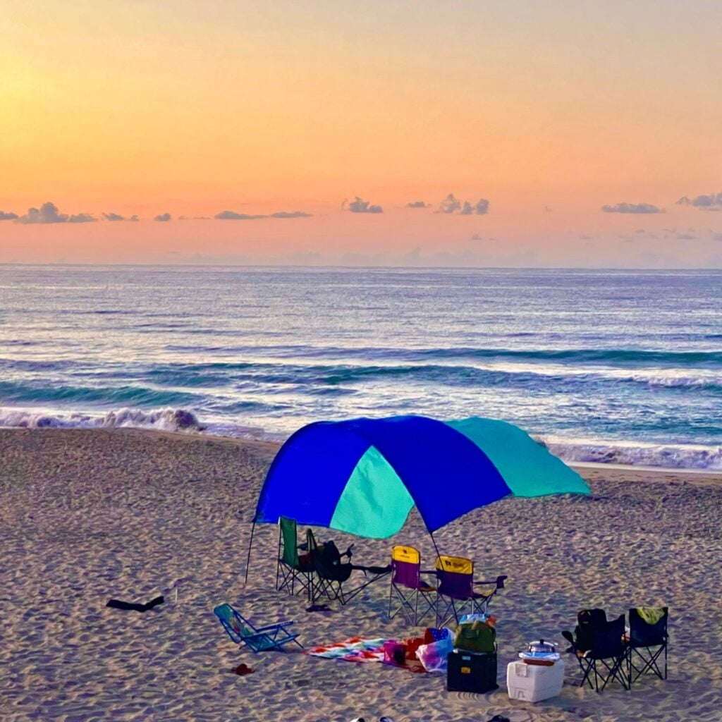 A golden hour sunrise at Emerald Isle, NC with a shibumi shade.
