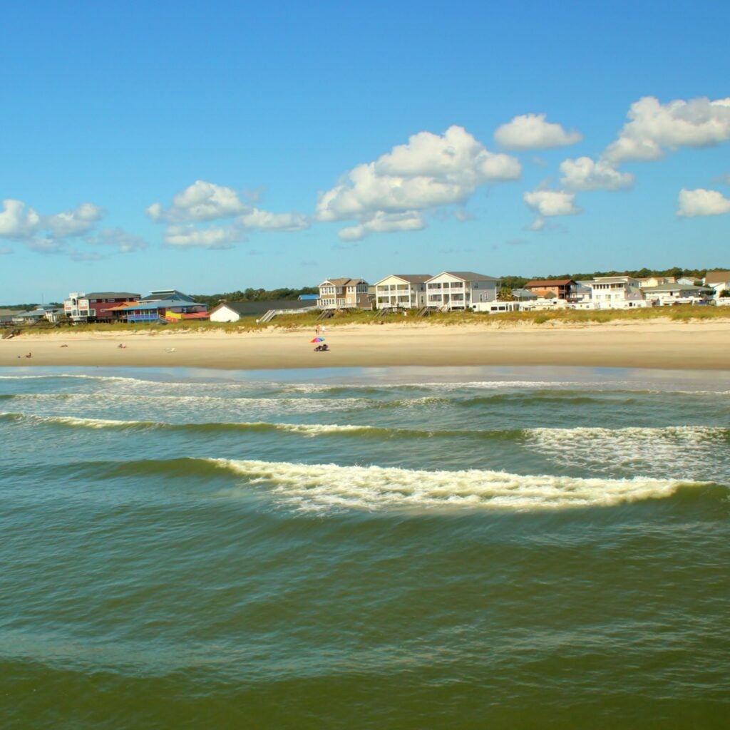 Views of the Holden's Beach in NC with ocean front properties in the background