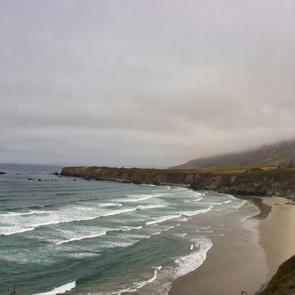 Exploring Sand Dollar beach in Big Sur on a foggy summer day