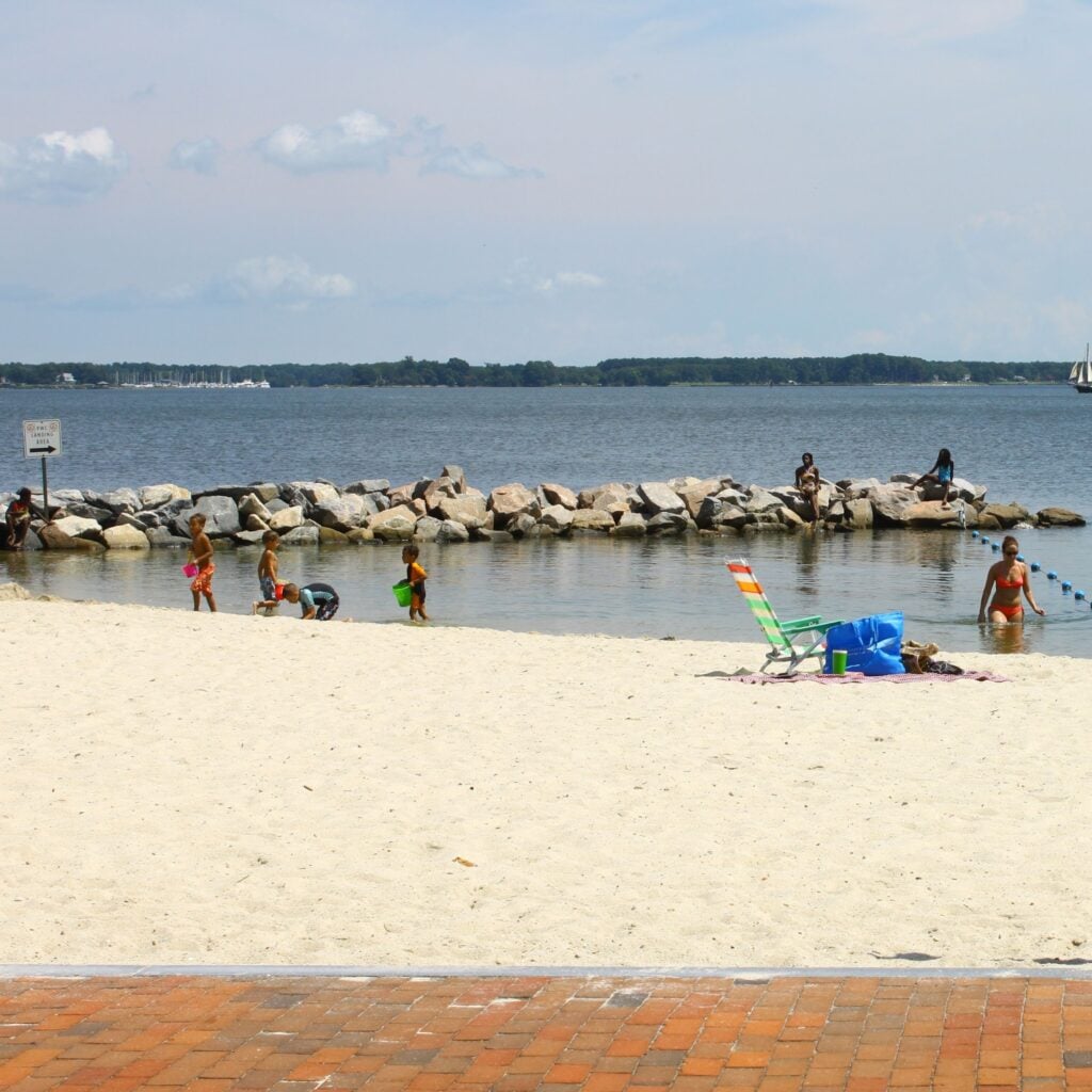 YORKTOWN - AUGUST 7:People on the waterfront on August 7, 2013 in Yorktown Virginia.The area attracts visitors Spring and Summer and is a national landmark of the American Revolutionary and civil Wars