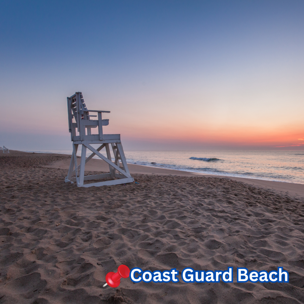 An empty lifeguard chair overlooks the quiet shoreline at Coast Guard Beach in Eastham, MA, as the sun rises over gentle waves under a pastel sky.